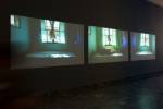 Mwangi Hutter. Turquoise Realm, 2014. Installation view, BOZAR, Brussels. Three channel video, dimensions variable. Courtesy of the artist.